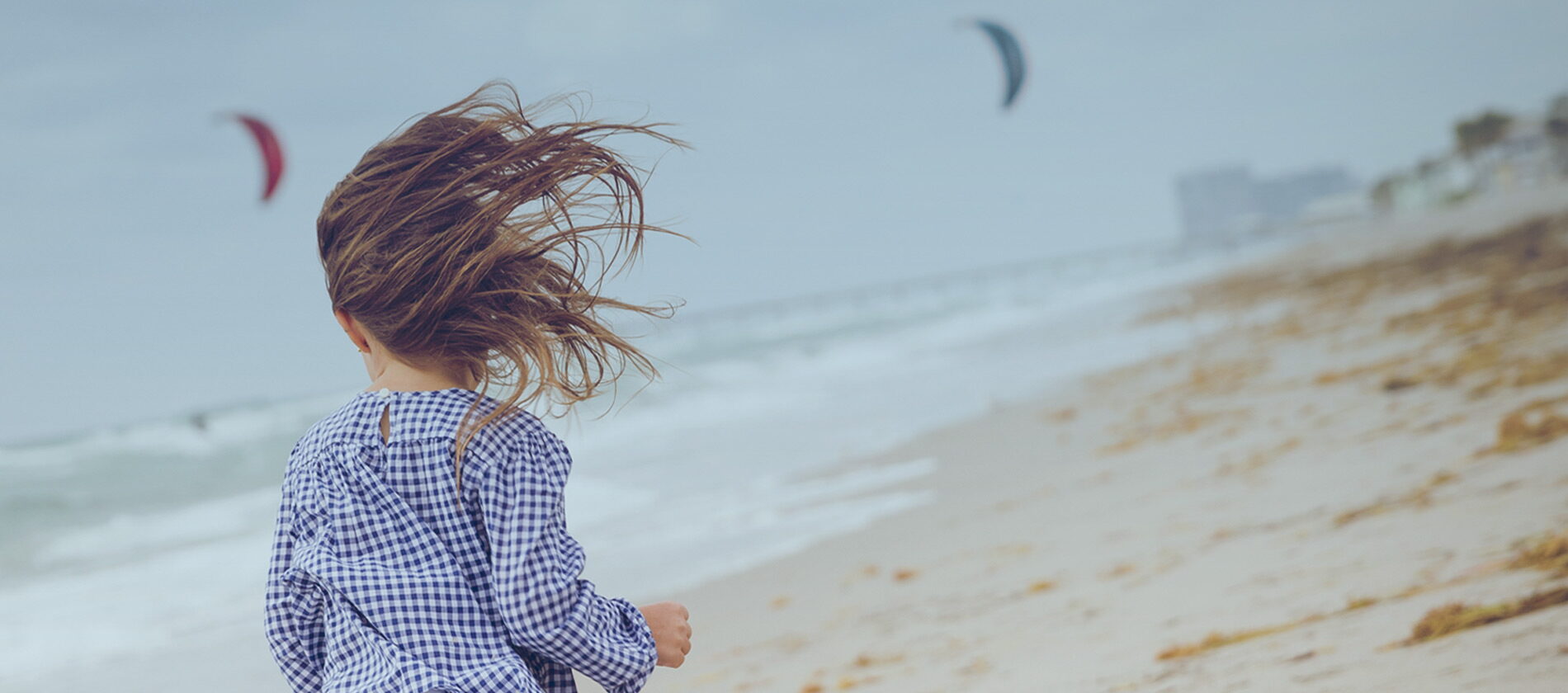Girl on the beach at Leisure Bay